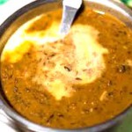 Dal Garnished with Homemade Butter